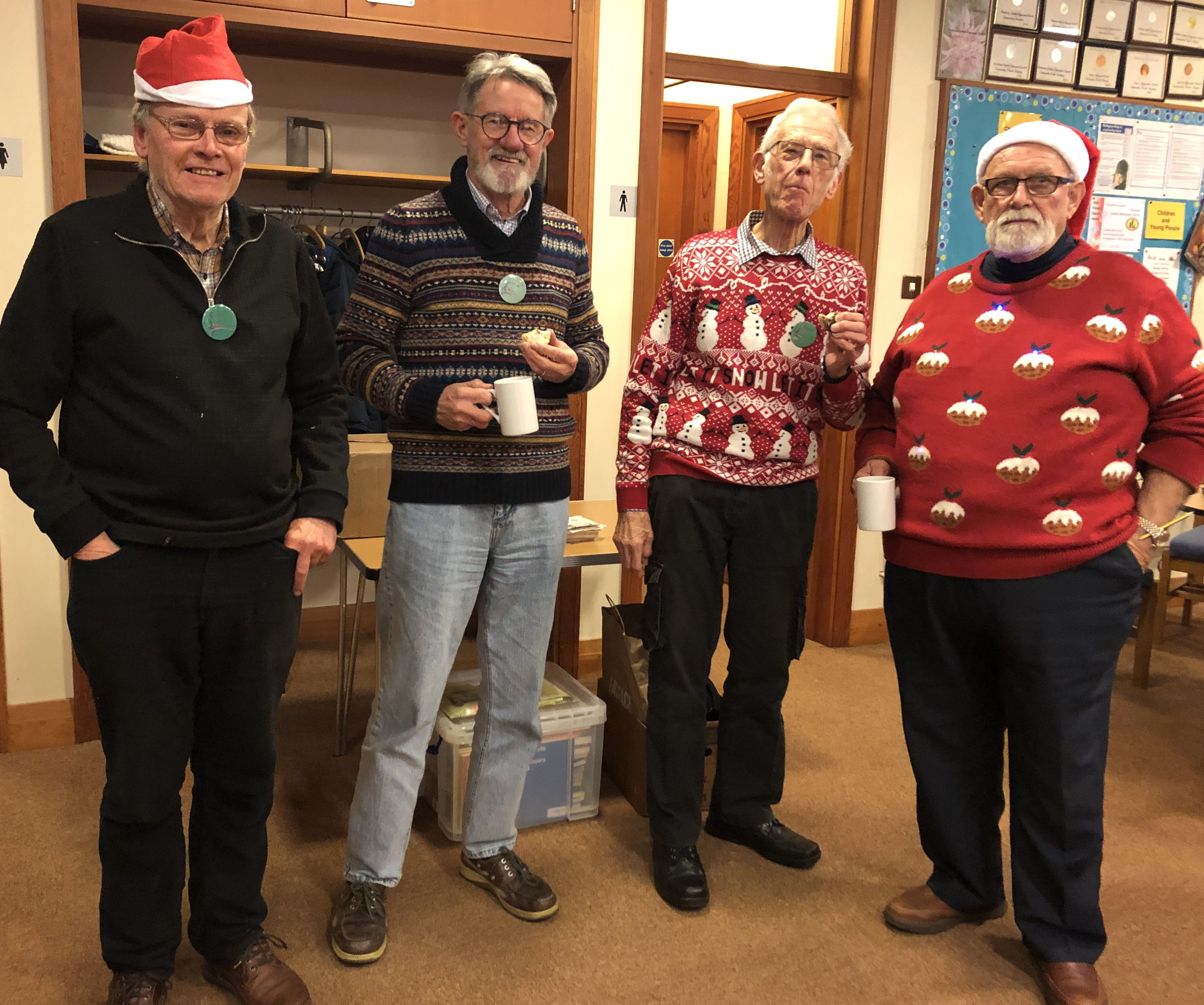 Four chaps - Robert, George, Peter, Tim badged